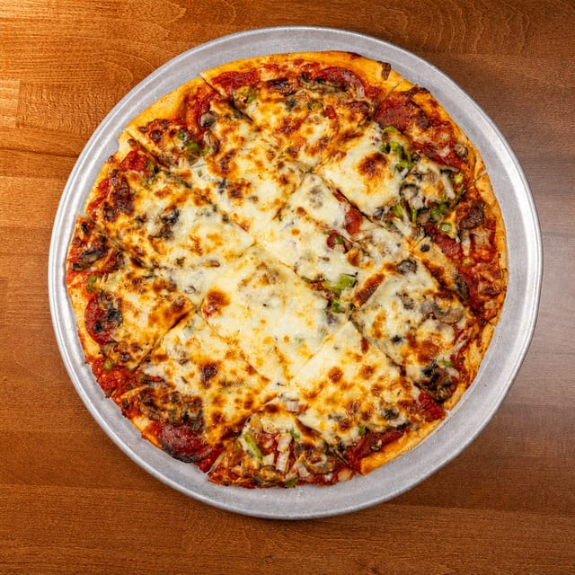 Medium Supreme Thin Crust Pizza.